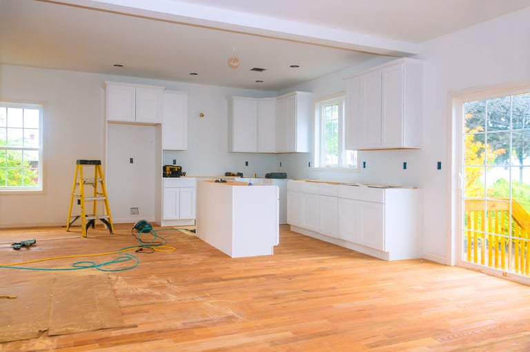 Kitchen renovation with white cabinets
