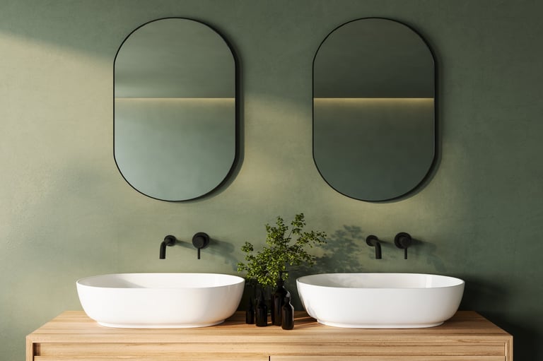 Modern bathroom with dual mirrors and black faucets